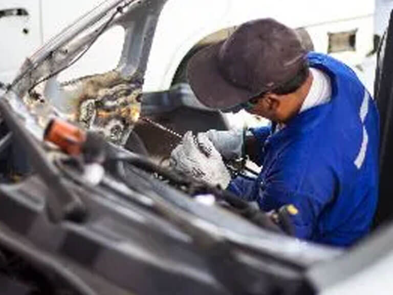 Man Repairing Car