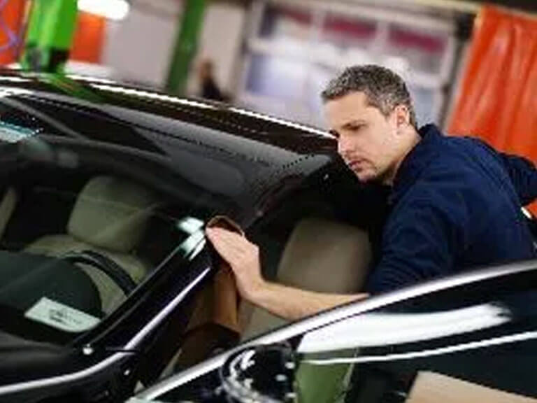 Man Working On Car